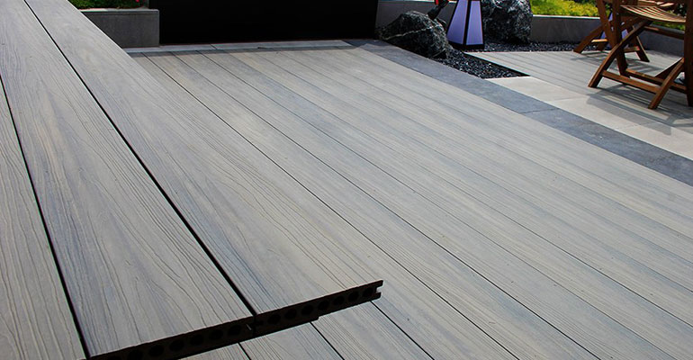 What causes the composite decking to warp?